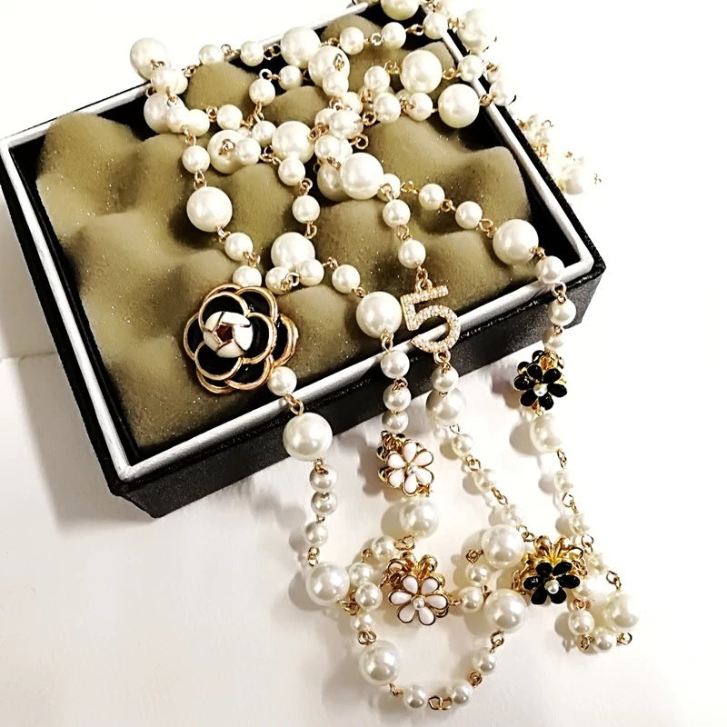 Double pendant long chain necklace styled on model – party jewellery UK
