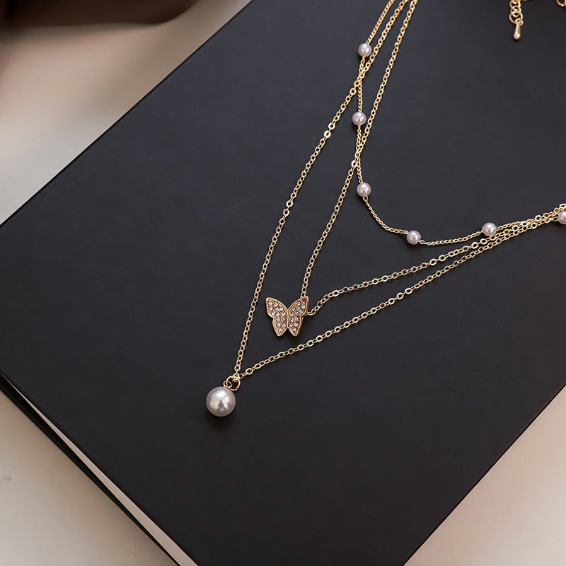 Butterfly pearl layered necklace product detail – minimalist women necklace