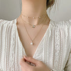 Layered butterfly necklace styled – dainty pearl pendant jewellery women