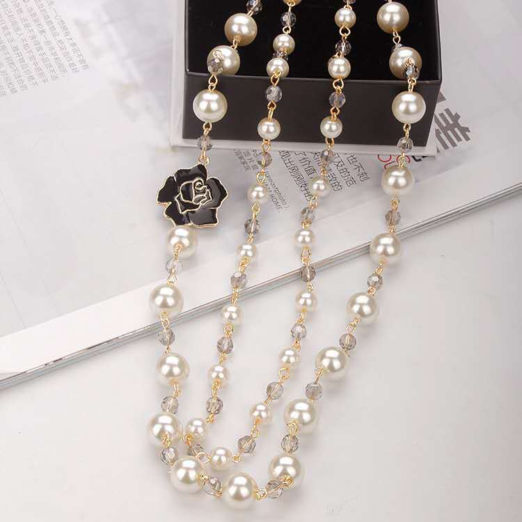 Oversized pearl necklace styled on model – luxury pendant necklace women