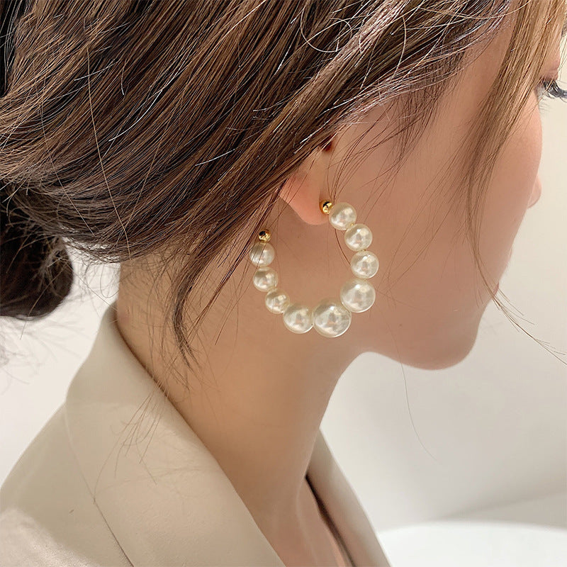 Pearl hoop earrings close-up – dainty circle earrings jewellery Sparklesway