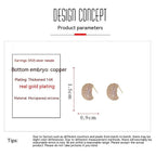 Product specifications of earrings with gold plating and micropaved zirconia details.