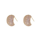 Pair of purple gemstone stud earrings on a white background