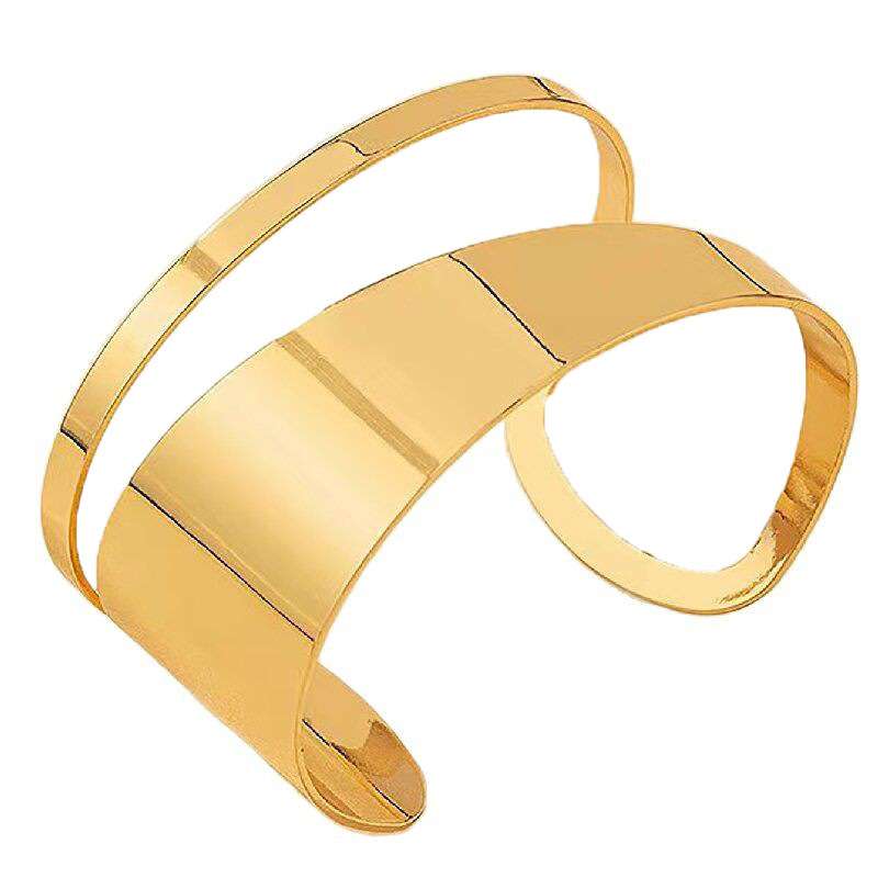 Gold bangle on a white background