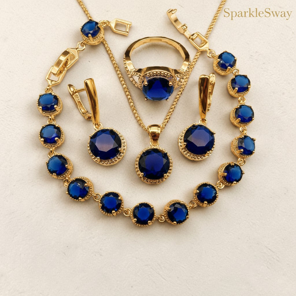 Jewelry set with blue stones on a light beige background, featuring the brand 'SparkleSway'.