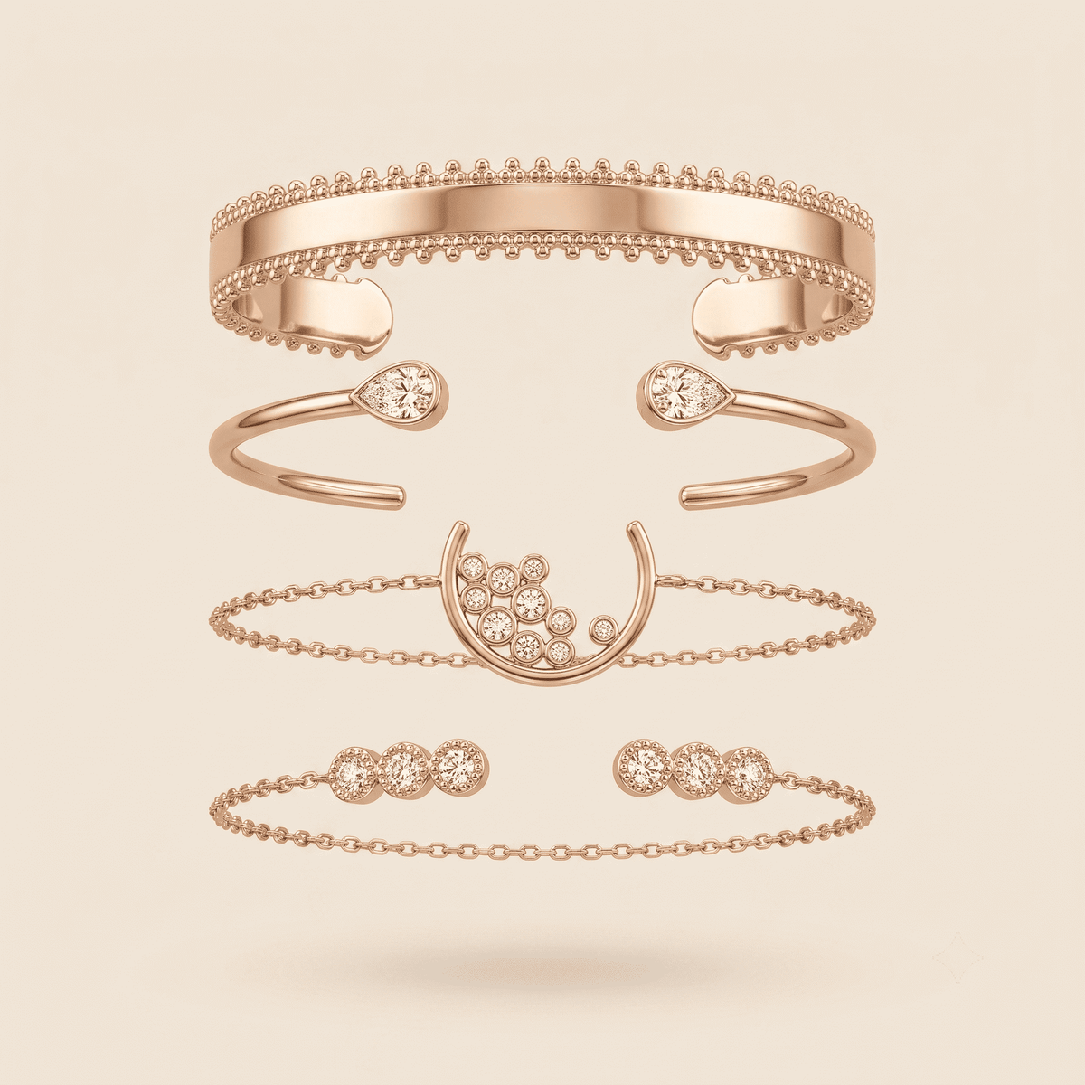 A set of five rose gold jewelry pieces, including two cuff bracelets, an open bangle with teardrop gemstones, a crescent moon with a cluster of clear stones, a delicate chain bracelet, and a matching chain link bracelet, arranged vertically on a light beige background.