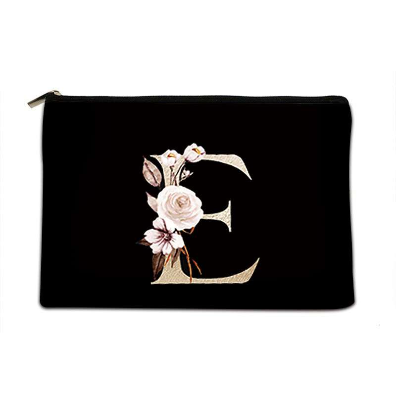 Black pouch with floral design and letter 'E' on a white background