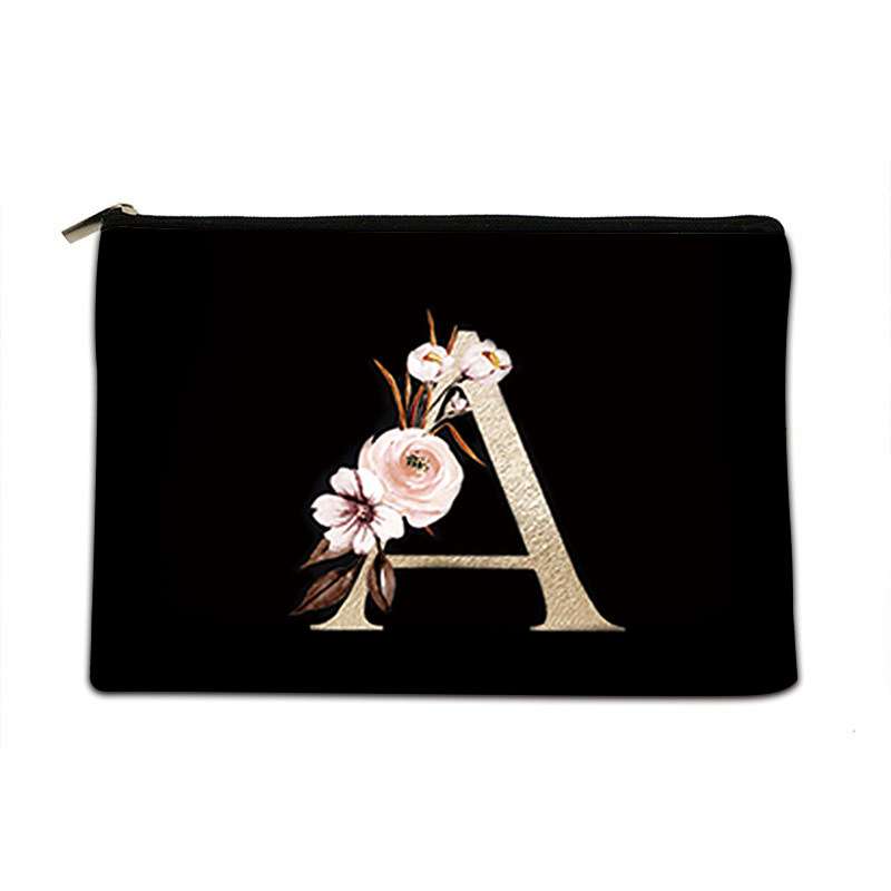Black pouch with floral design and letter 'A' on a white background