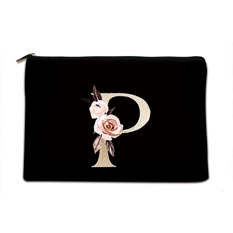 A black zippered pouch featuring a large decorative letter 'P' embellished with pink and beige roses, set against a plain white background.