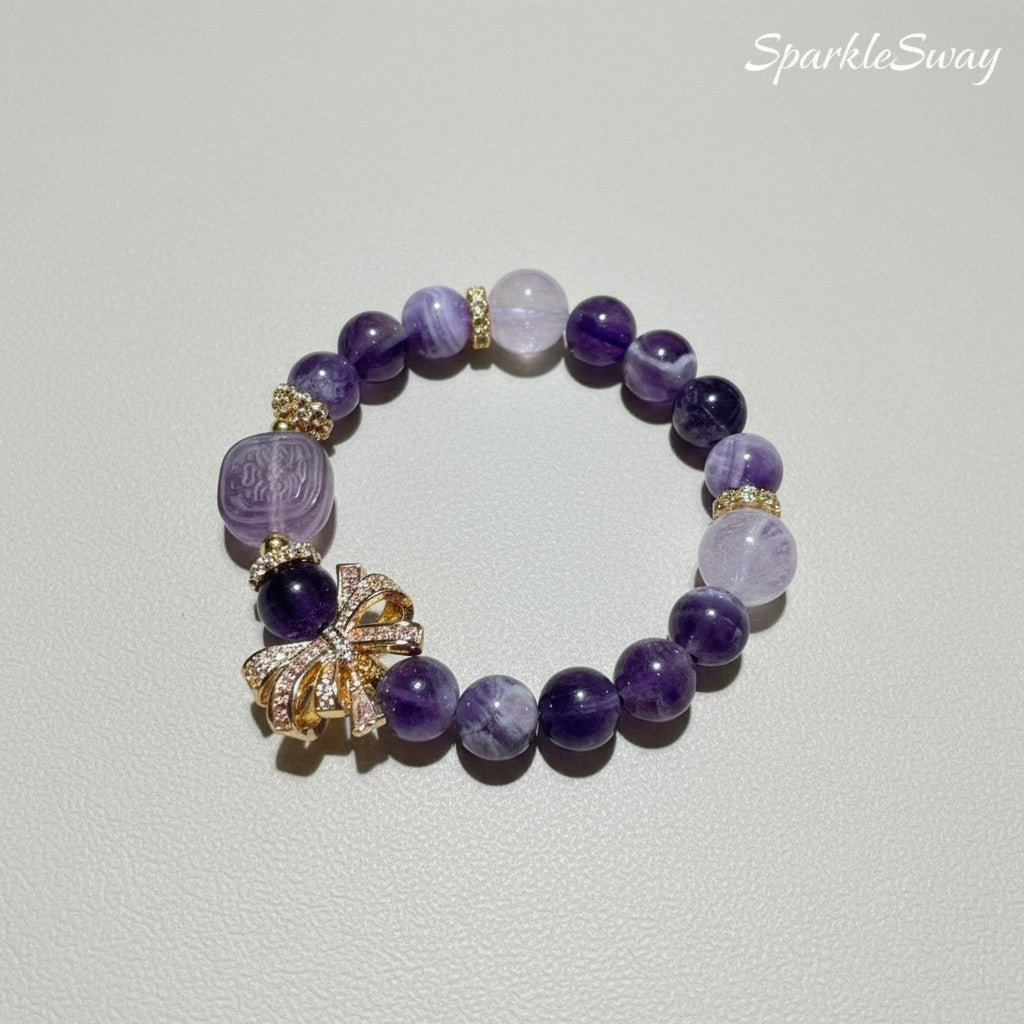 Purple beaded bracelet with decorative elements on a light gray background