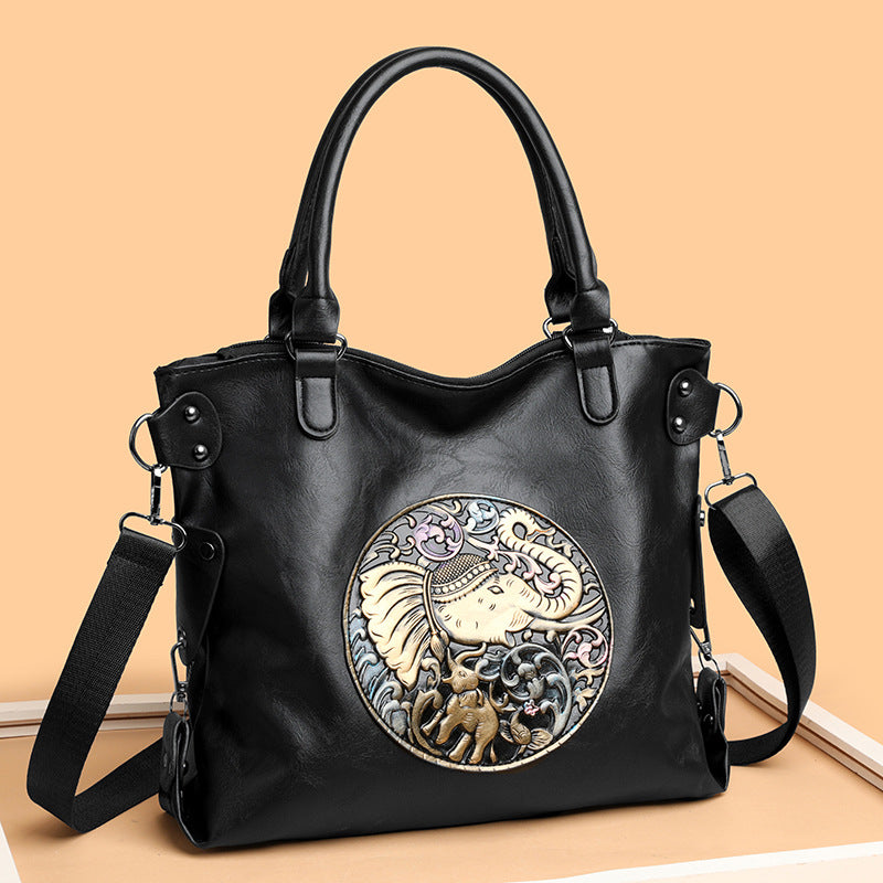 Retro Chinese Style Graceful And Fashionable Soft Bread bag with elephant design in black leather.