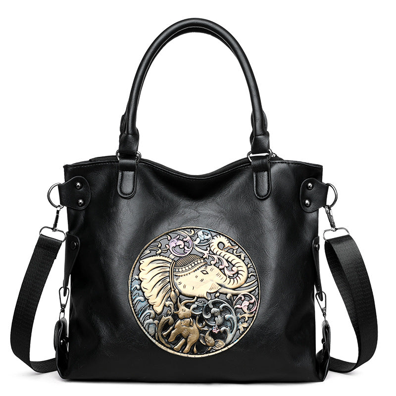 Retro Chinese Style Graceful And Fashionable Soft Bread black handbag with elephant design.