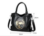 Retro Chinese Style Graceful And Fashionable Soft Bread handbag in black with stylish circular design, dimensions 33x11x28cm.