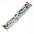 Beaded bracelet with decorative metal ends on a white background