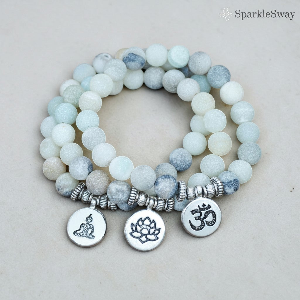 Stack of frosted beaded bracelets with symbolic charms on a light background, branded 'SparkleSway'.