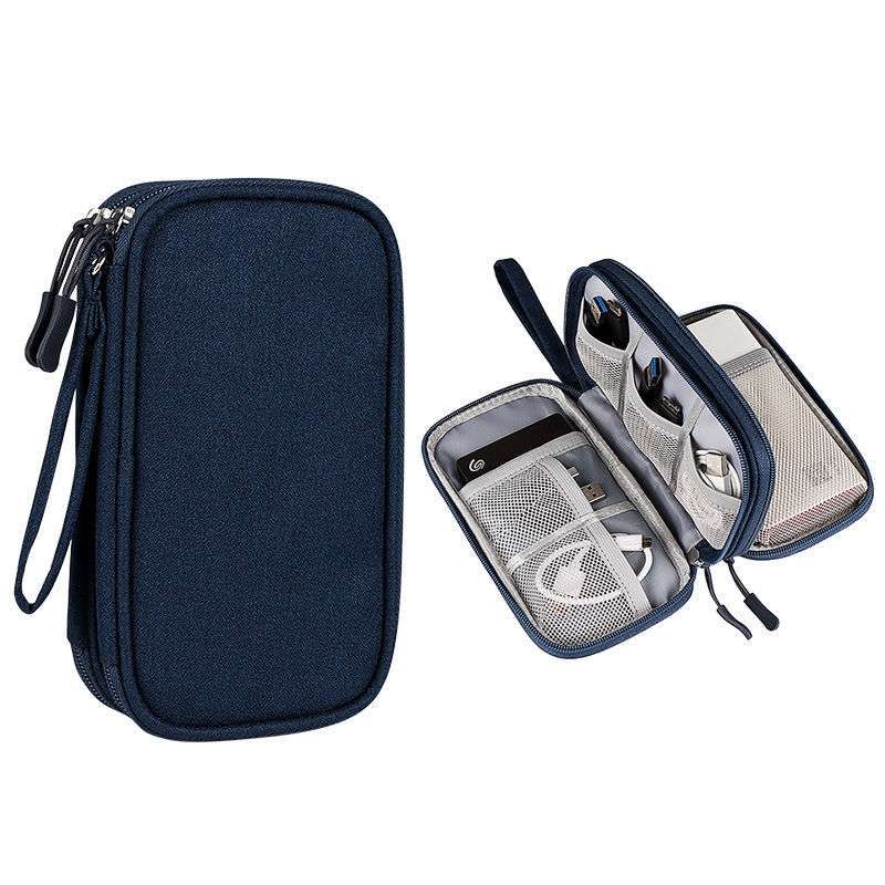 Navy blue travel case with open view showing electronic devices on a white background