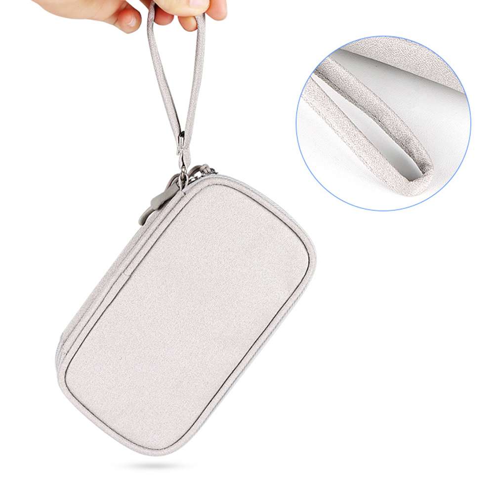 Light gray travel pouch with handle, showing interior texture on a white background