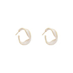 Pair of metallic car door handles on a white background