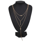Dotted bar pendant necklace styled on model – dainty gold necklace women UK