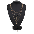 Dotted bar pendant necklace styled on model – dainty gold necklace UK